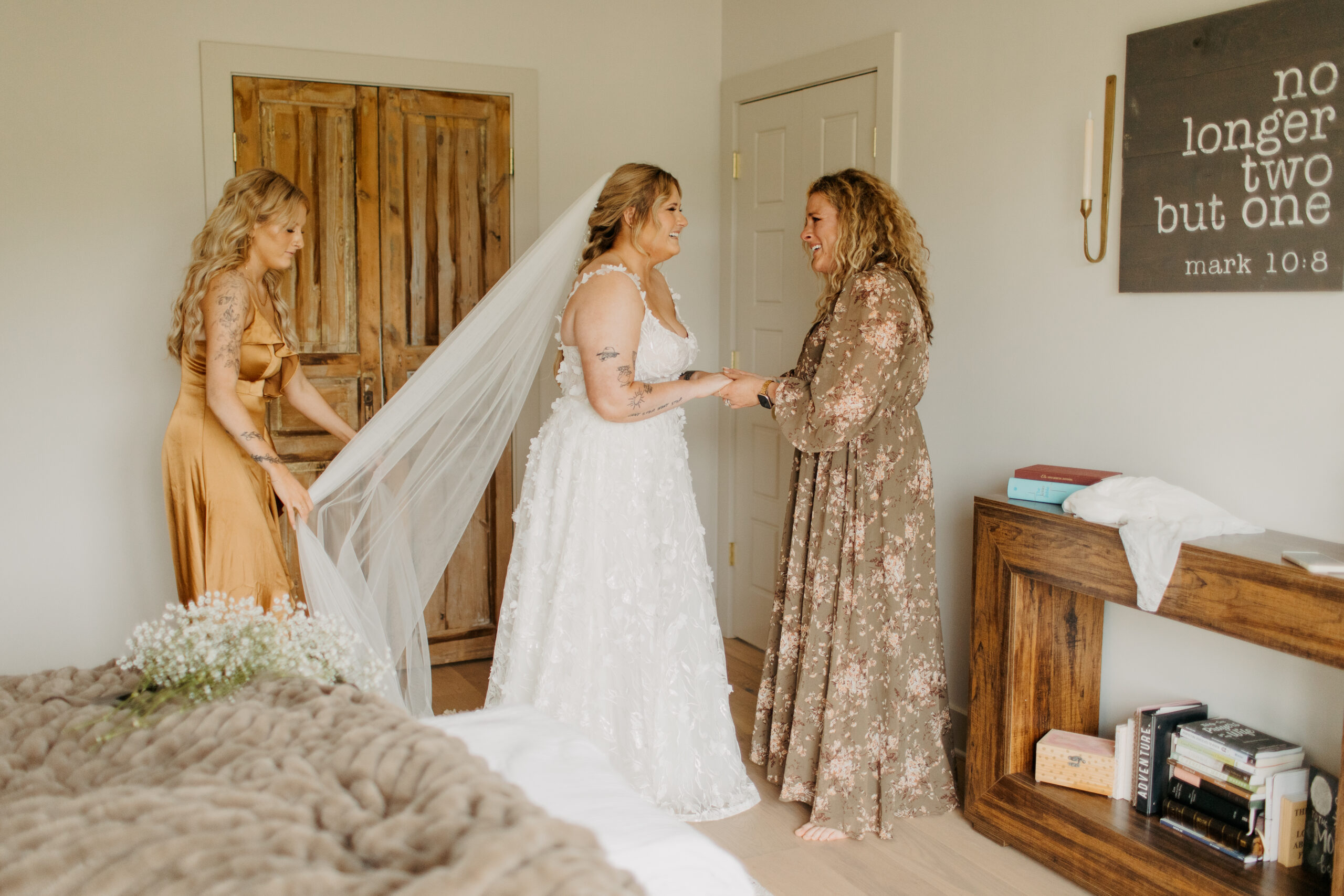 Beautiful getting ready photos of mother of bride, sister of bride, and the bride